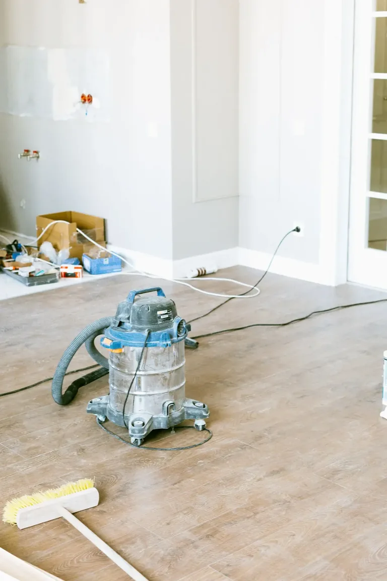 Cleaner removing fine dust from a completed interior