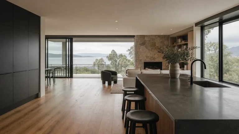 An open-plan home with timber floors, kitchen and living areas