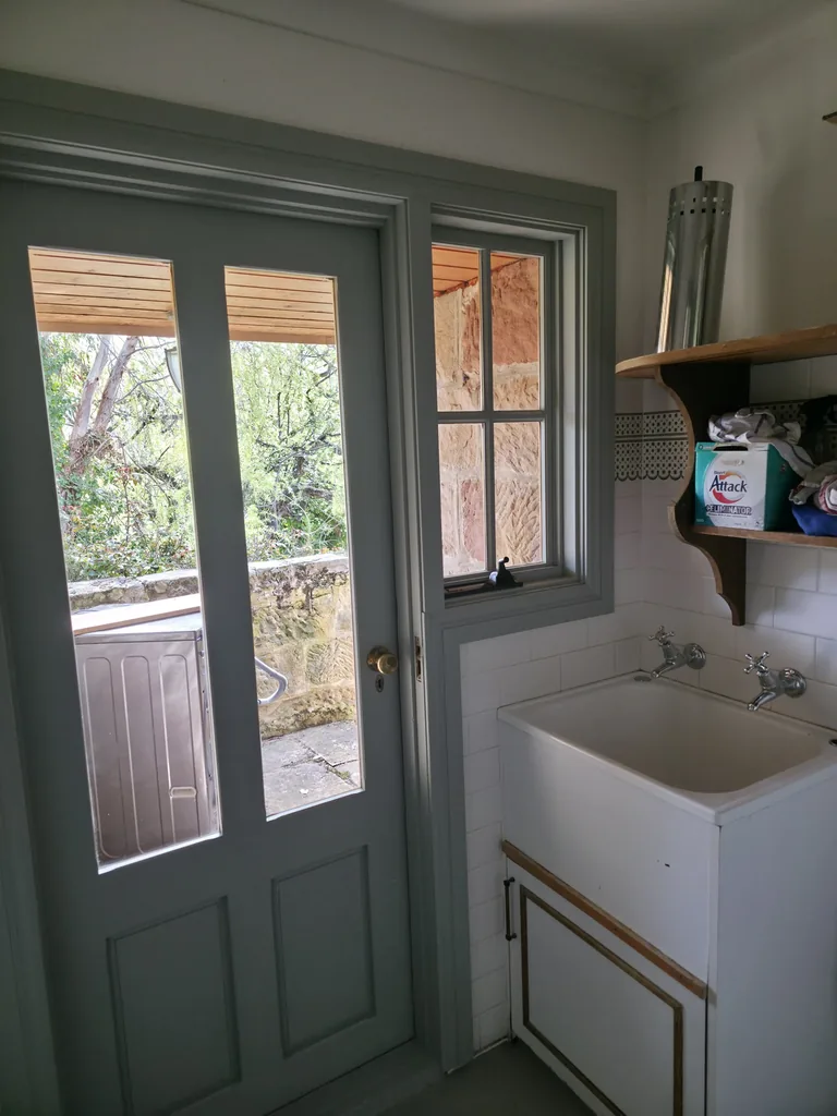Laundry sink and glazed door