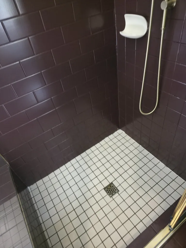 Tiled shower base and wall fittings