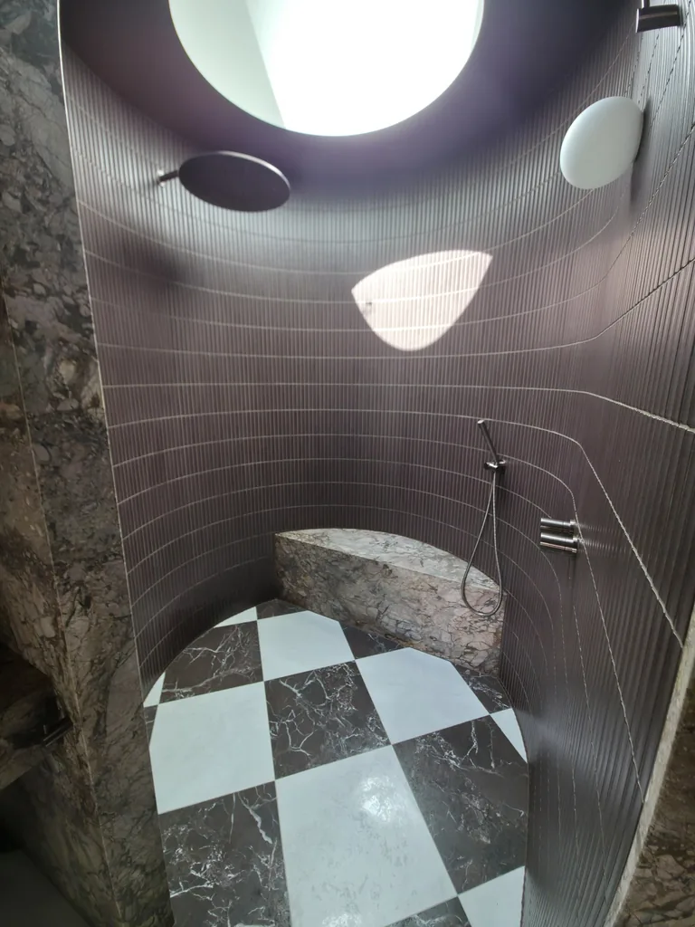 Circular shower enclosure and checkerboard floor