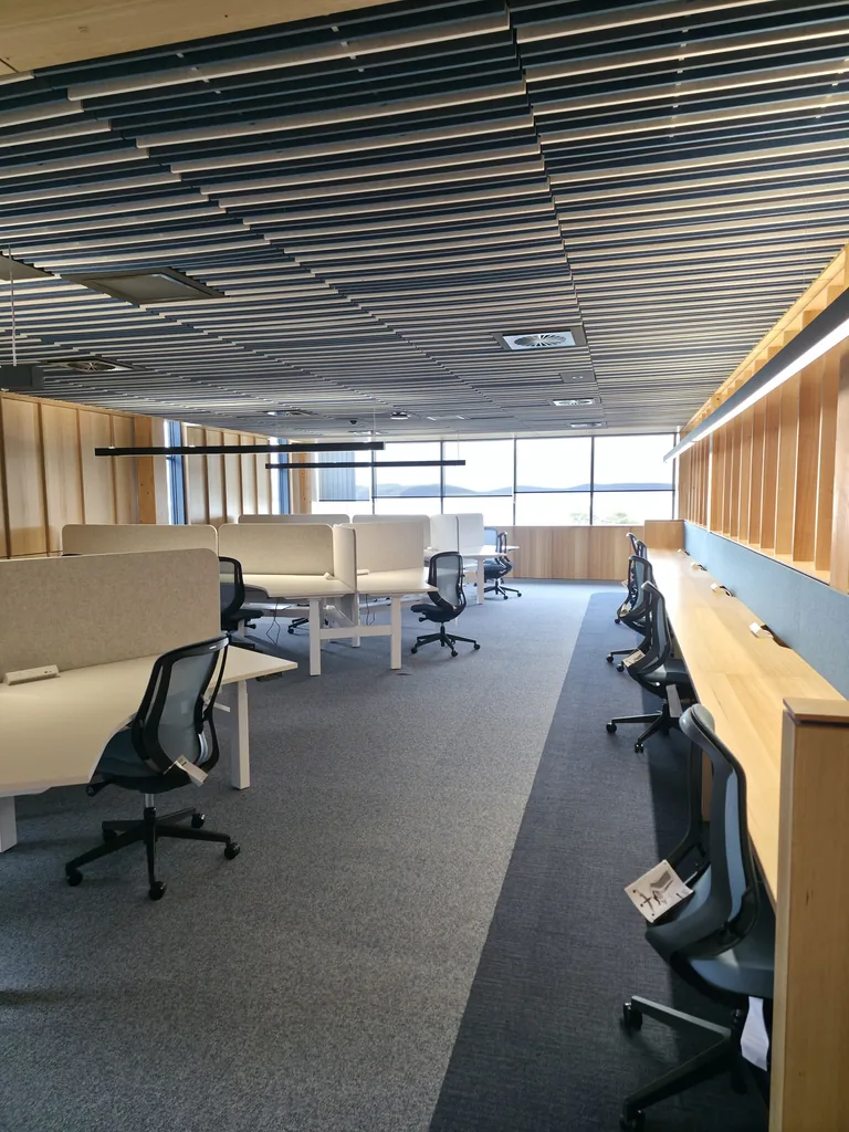 Desks and chairs in the VOS UTAS workspace after our post-construction clean in Taroona
